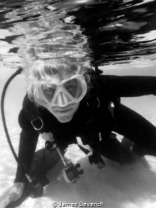 Mucking about in the shallows by James Deverich 
